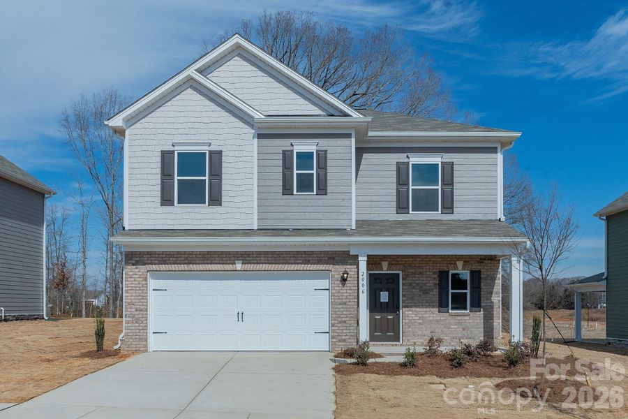Front exterior of a new home in Cedar Meadows, Monroe, NC, highlighting curb appeal (Image 20).