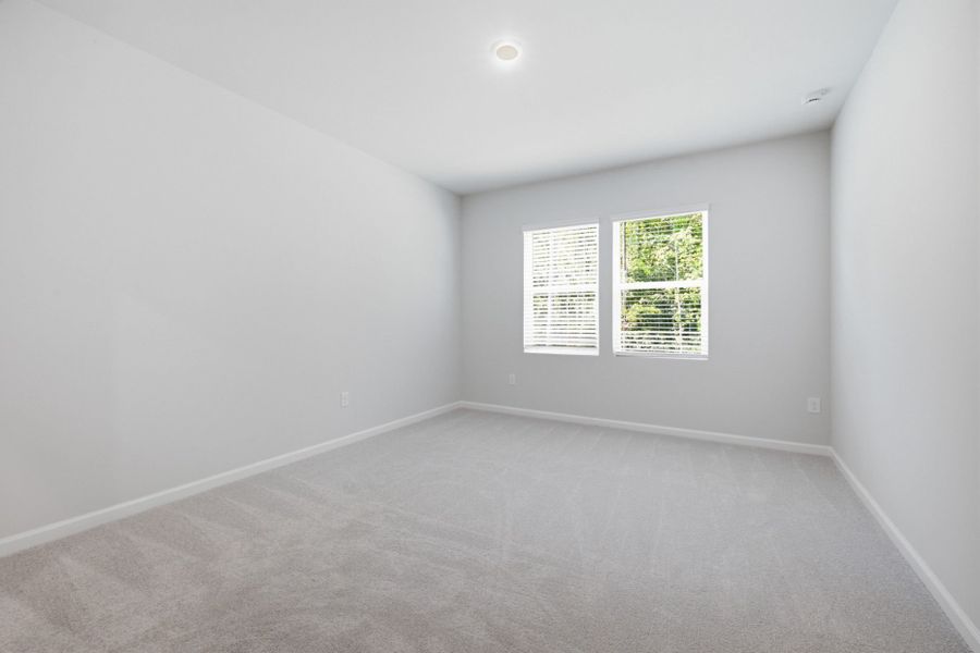 Spacious, unfurnished interior of a new home in Carpenter Falls, Durham (Image 41).
