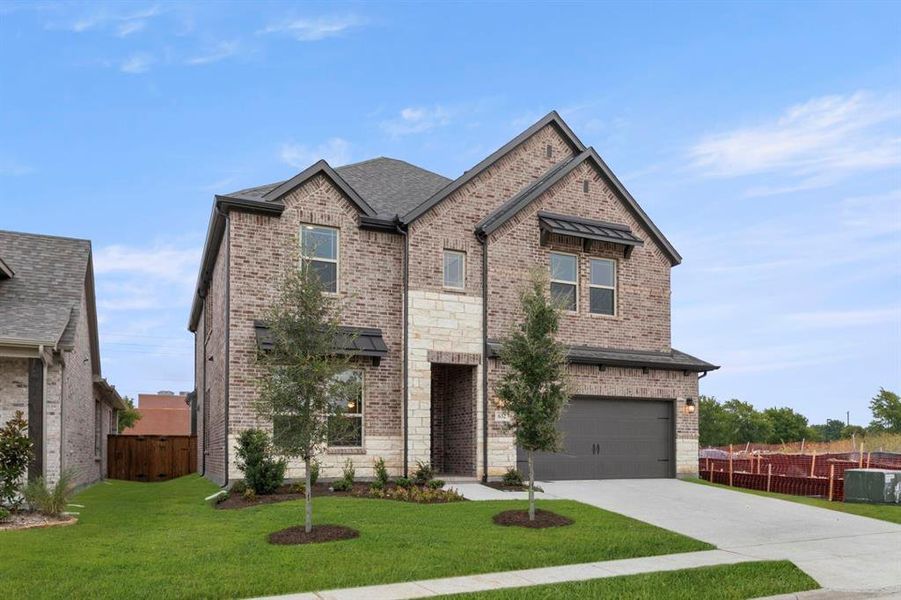 Front exterior of a new home in River Ranch, Van Alstyne, TX, highlighting curb appeal (Image 23). Front exterior of a new home in River Ranch, Van Alstyne, TX, highlighting curb appeal (Image 23).