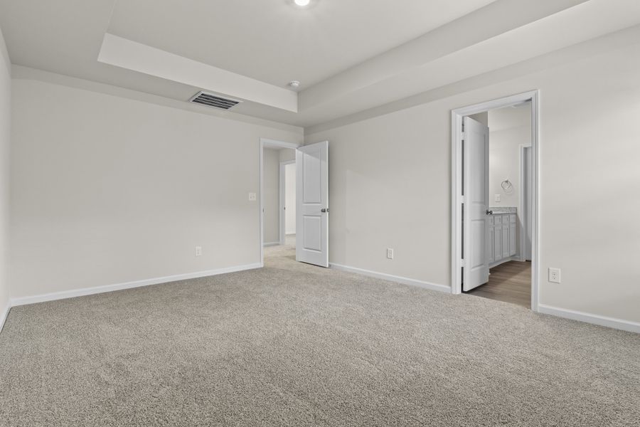 Representative unfurnished interior of a home built from the Cedar A by McGuinn Homes in Forts Ridge, Pelion (Image 17).