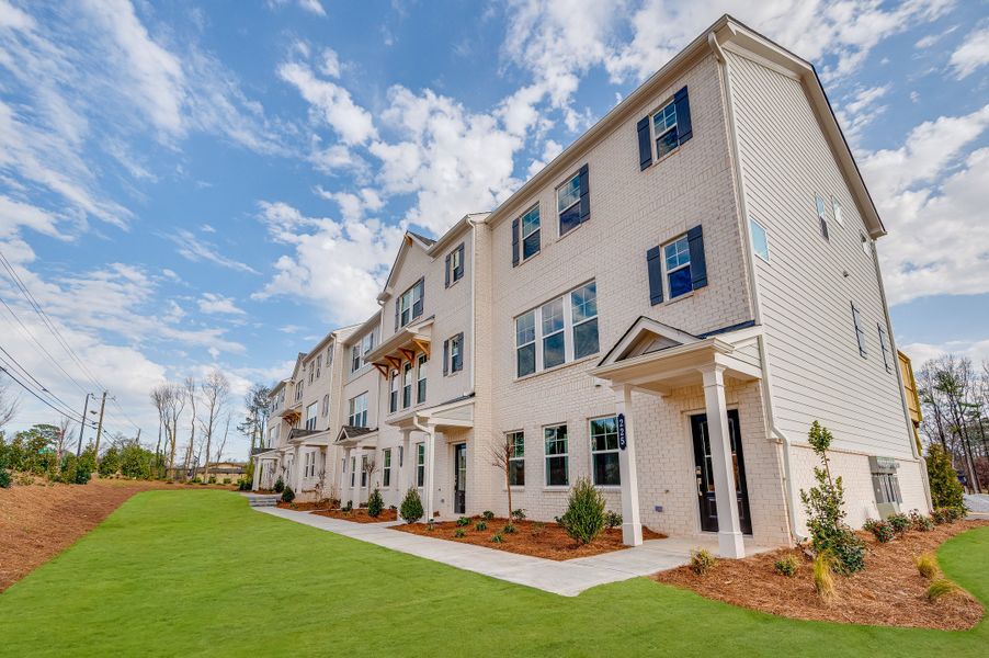 Front exterior of a new home in Somerset at Veterans Memorial, Mableton, GA, highlighting curb appeal (Image 15). Front exterior of a new home in Somerset at Veterans Memorial, Mableton, GA, highlighting curb appeal (Image 15).