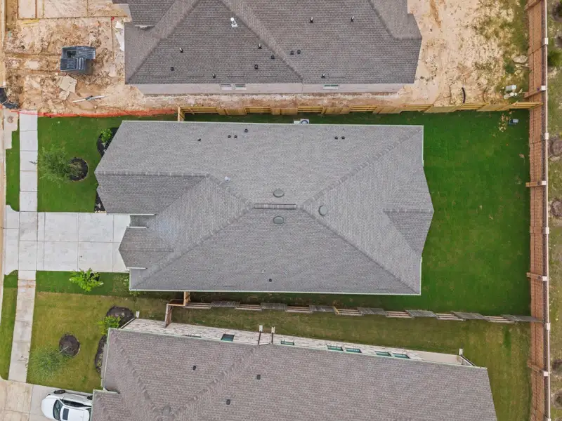 Exterior details and patio area of a home in Elyson 60's, Katy (Image 24).