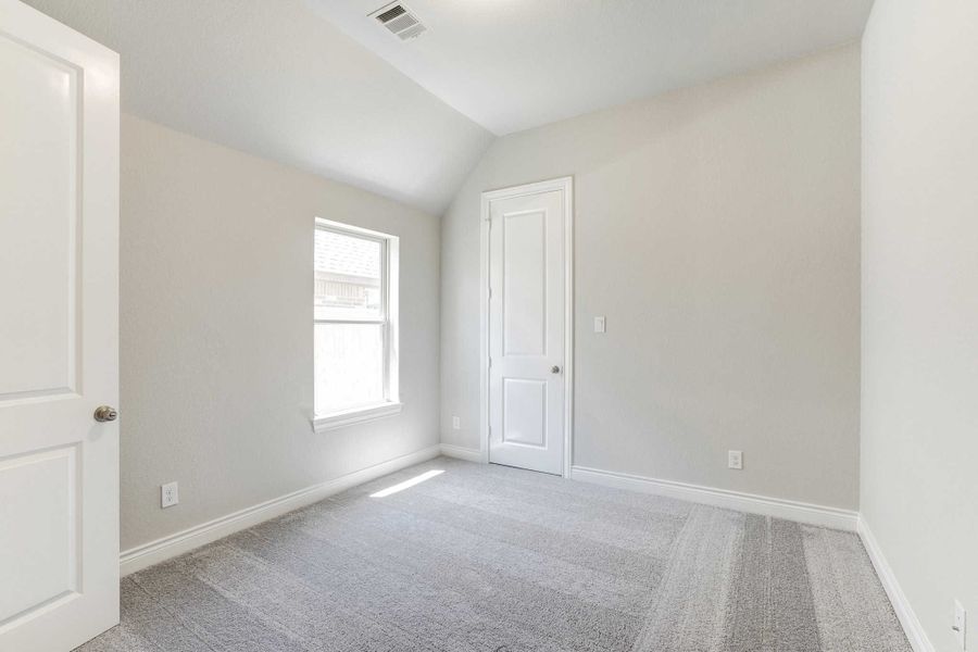 Representative unfurnished interior of a home built from the 2688 by Ravenna Homes in The Woodlands Hills 65′, Willis (Image 31).