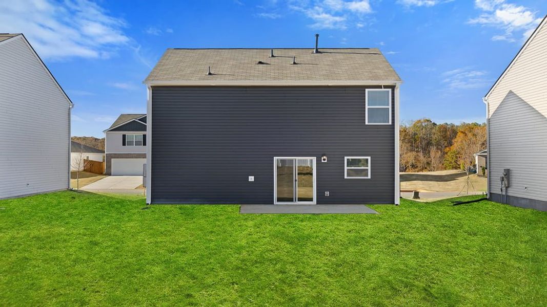 Exterior details and patio area of a home in Lightwood Cottages, Moore (Image 2).