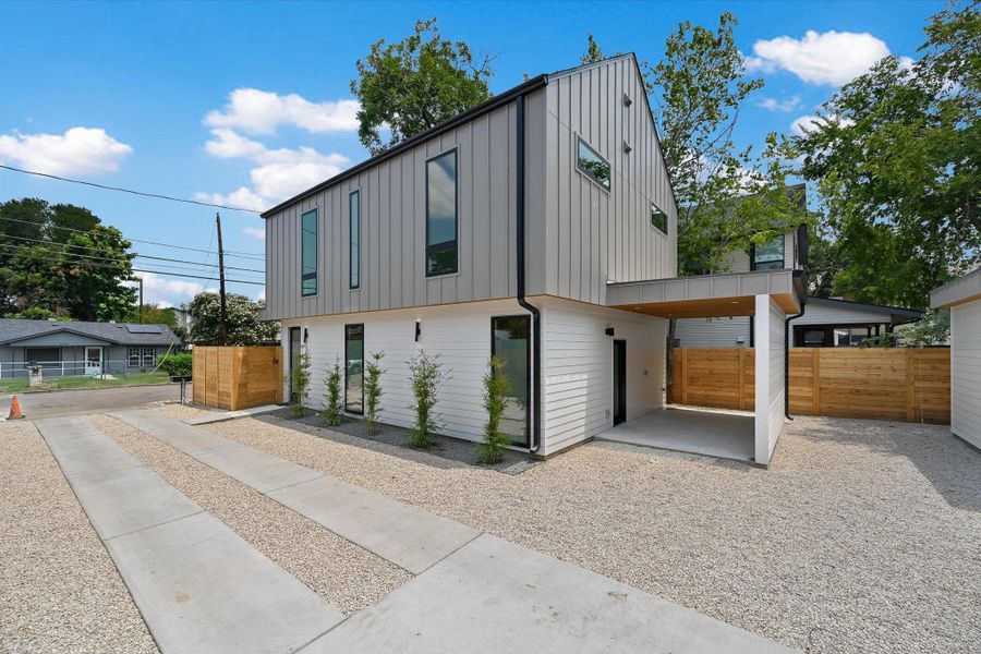 Contemporary home featuring board and batten siding