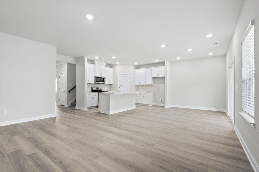 Spacious, unfurnished interior of a new home in Waterside - Coastline Series, Longs (Image 18).