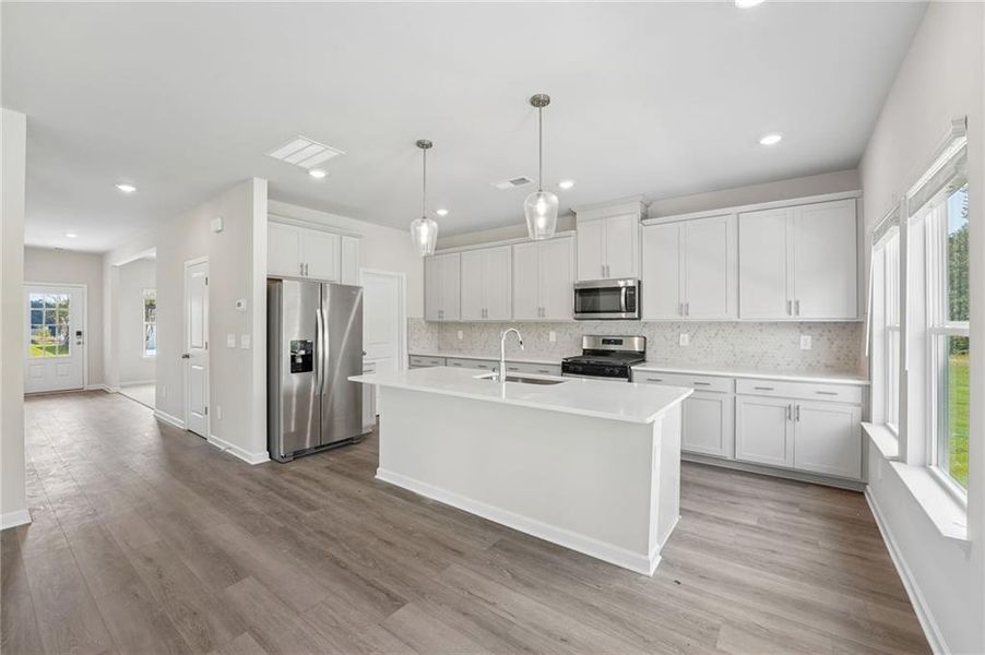 Furnished interior view inside a new home in Northwoods at Mirror Lake, Villa Rica (Image 15).