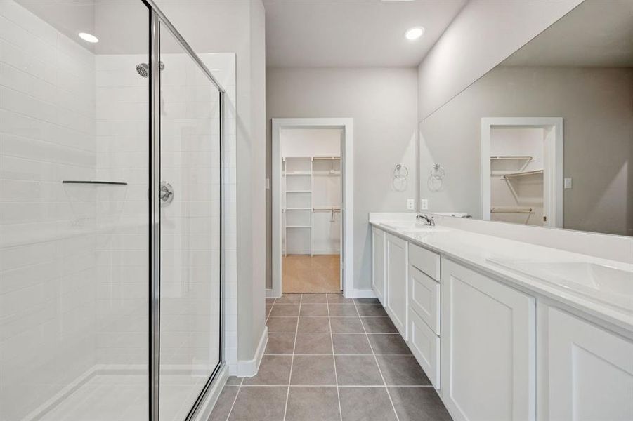 Primary Bathroom in the Mesquite home plan by Trophy Signature Homes REPRESENTATIVE PHOTO Primary Bathroom in the Mesquite home plan by Trophy Signature Homes REPRESENTATIVE PHOTO