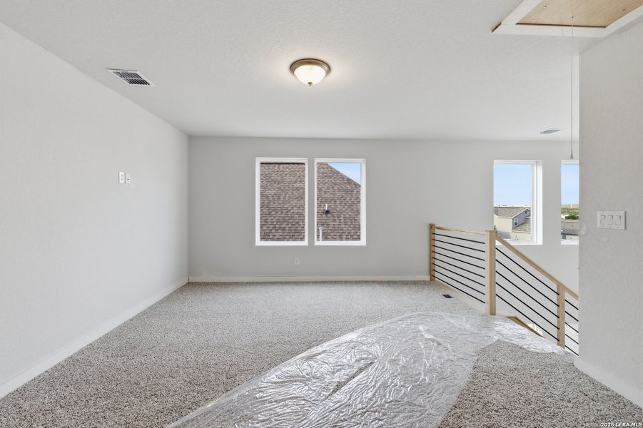Spacious, unfurnished interior of a new home in The Meadows at Hunters Ranch, San Antonio (Image 6).