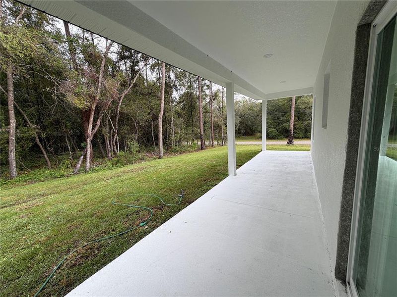 Exterior details and patio area of a home in , Citrus Springs (Image 30).