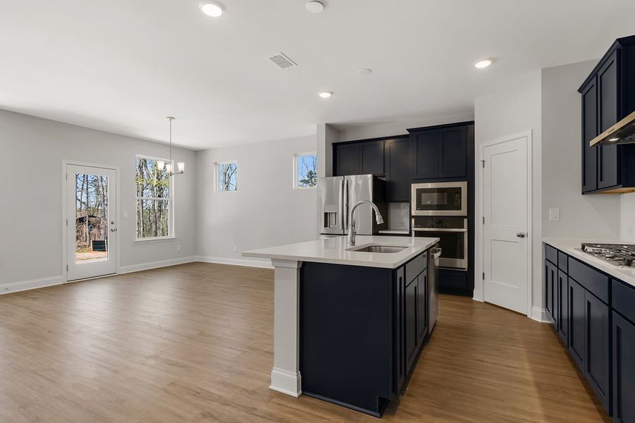 Representative furnished interior of a home built from the Emerson by UnionMain Homes in Maddox Landing, Hoschton (Image 9).