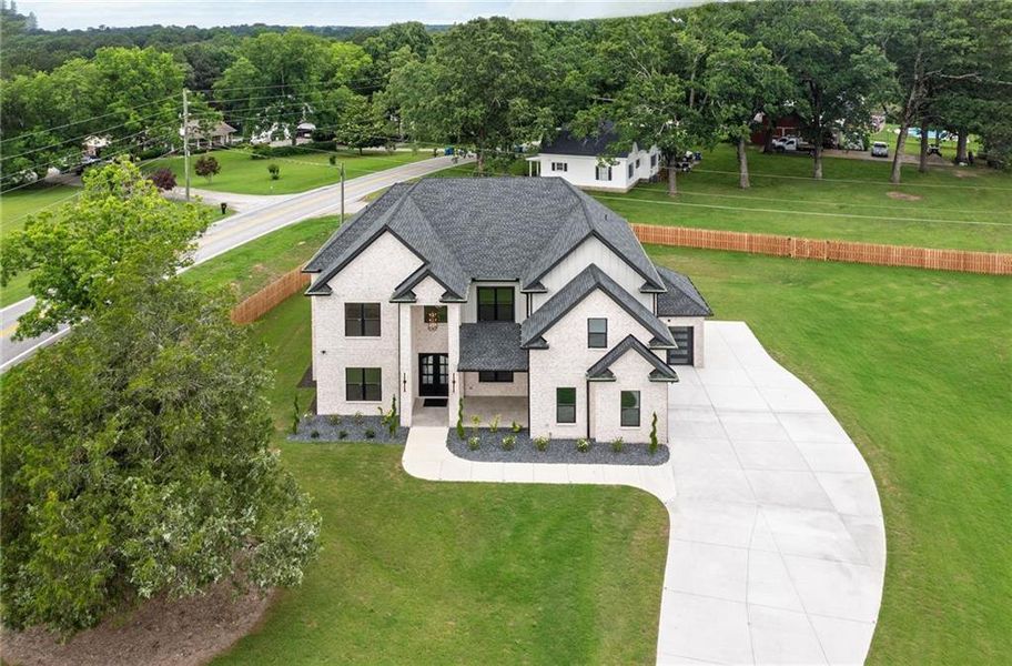 Front exterior of a new home in , Grayson, GA, highlighting curb appeal (Image 28).