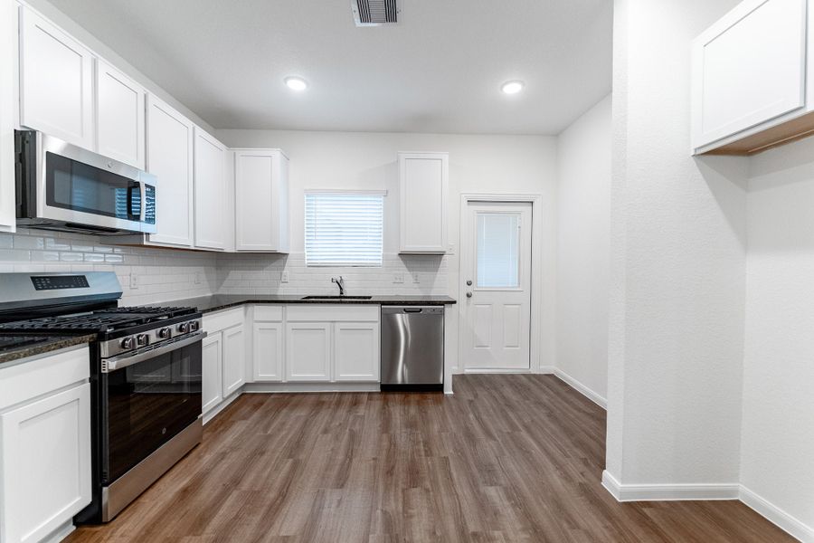 Furnished interior view inside a new home in Windrose Green, Angleton (Image 10).