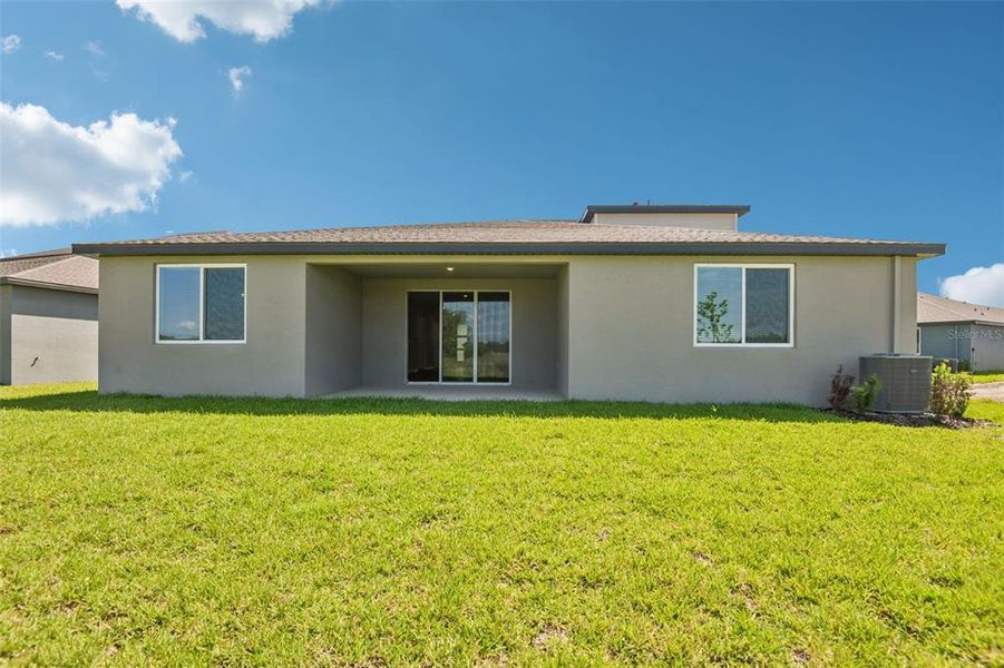 Exterior details and patio area of a home in Two Rivers - Signature Series, Zephyrhills (Image 2). Exterior details and patio area of a home in Two Rivers - Signature Series, Zephyrhills (Image 2).