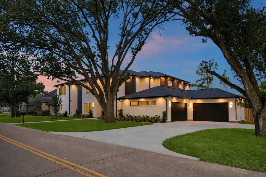 Front exterior of a new home in , Sugar Land, TX, highlighting curb appeal (Image 25).