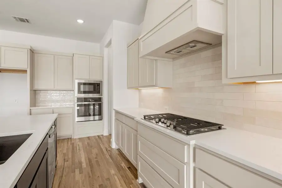 Furnished interior view inside a new home in Rolling Creek Ranch, Aledo (Image 11).
