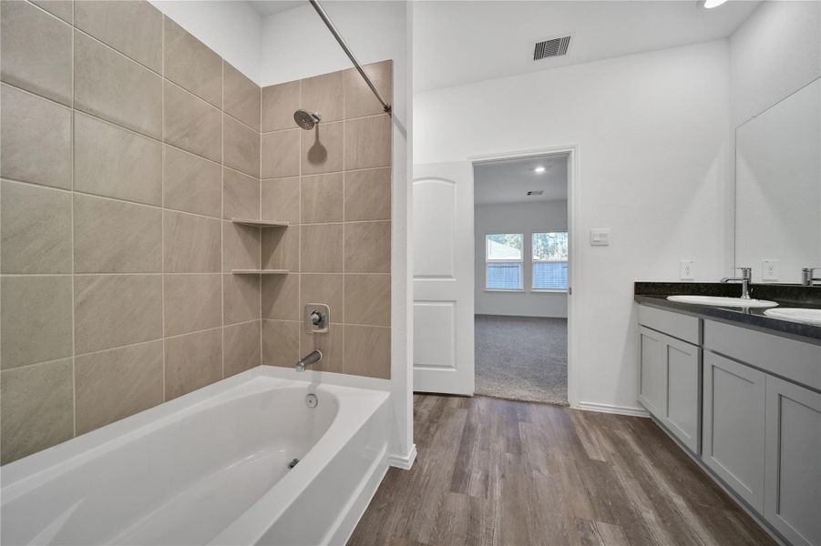 Furnished interior view inside a new home in Breckenridge Forest, Spring (Image 13).