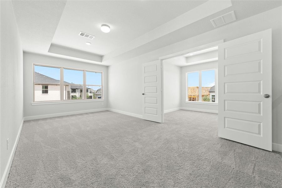 Spacious, unfurnished interior of a new home in Sunterra, Katy (Image 20).