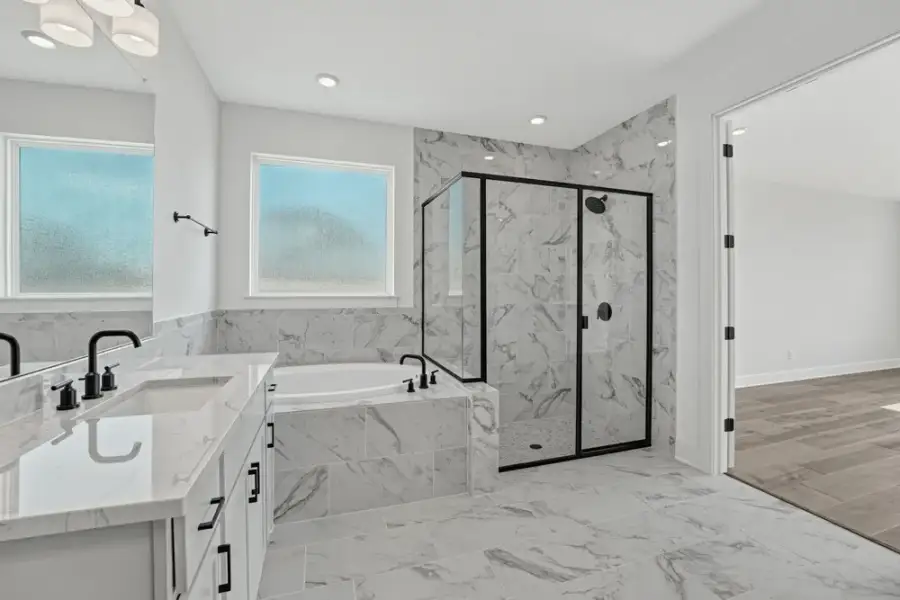 Furnished interior view inside a new home in Travisso, Leander (Image 6).