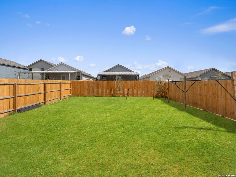 Exterior details and patio area of a home in Rose Valley, Converse (Image 28).