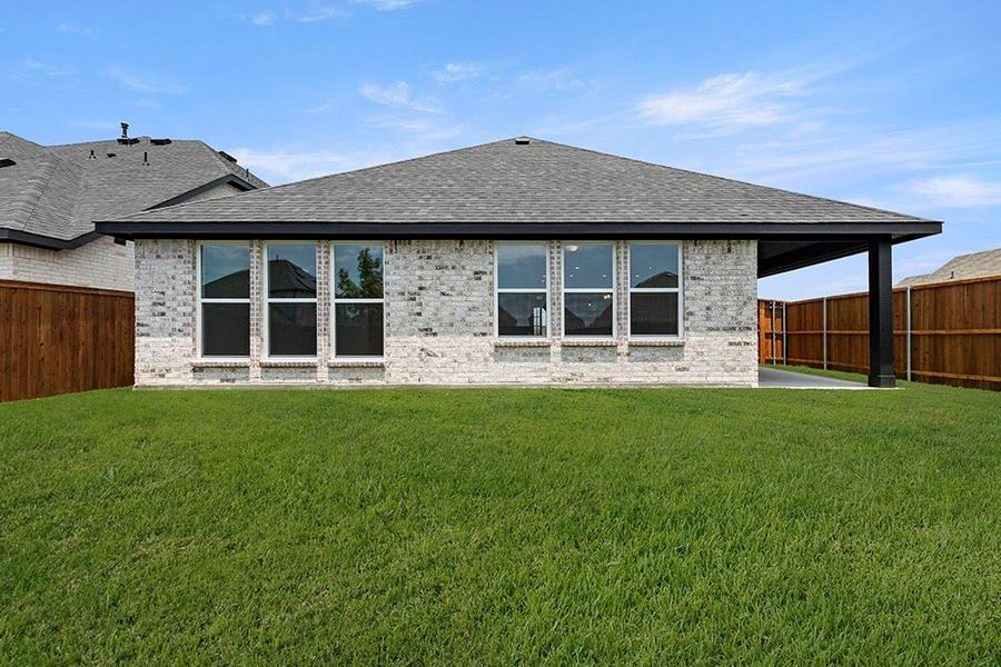 Exterior details and patio area of a home in Walden Pond, Forney (Image 25).