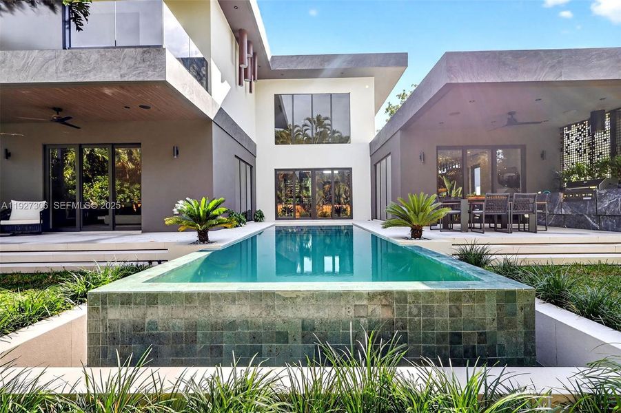 Exterior details and patio area of a home in , Biscayne Park (Image 39).
