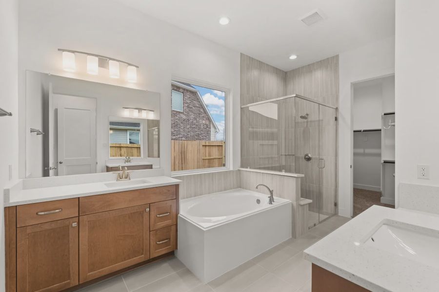 Representative furnished interior of a home built from the Mickelson by Chesmar Homes in Riceland Alley Loads, Mont Belvieu (Image 63).
