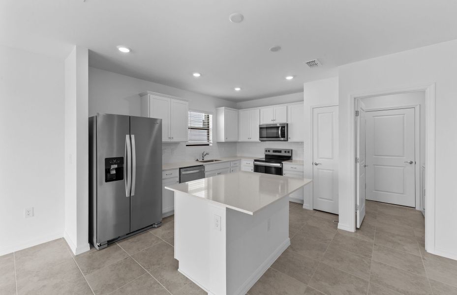 Furnished interior view inside a new home in Whispering Lakes, Lehigh Acres (Image 5).