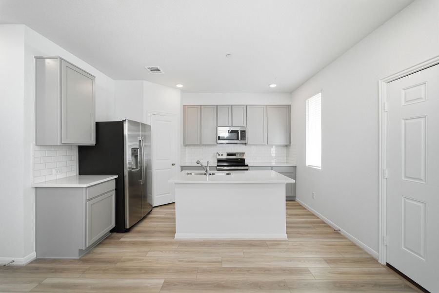 Furnished interior view inside a new home in Municipal Drive Townhomes, Leander (Image 4).