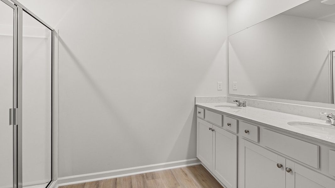 Representative furnished interior of a home built from the AMESBURY by D.R. Horton in Waypoint, Flowery Branch (Image 10).