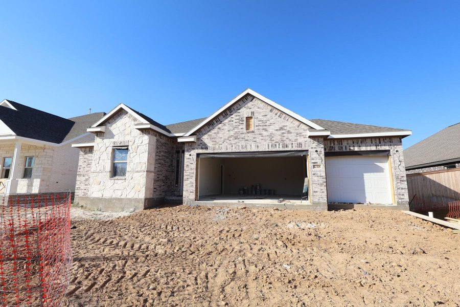 One story home with 4 beds, 2.5 baths, and 2 car garage.