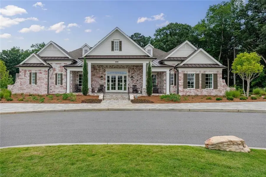 Front exterior of a new home in , Peachtree Corners, GA, highlighting curb appeal (Image 24).