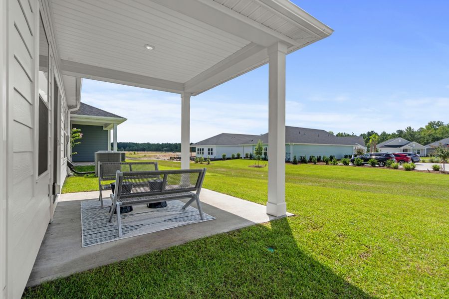 Exterior details and patio area of a home in Waterside - Boardwalk Series, Longs (Image 2). Exterior details and patio area of a home in Waterside - Boardwalk Series, Longs (Image 2).