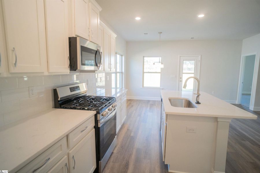 Furnished interior in a model home at Heritage Crossing in Simpsonville (Image 4).