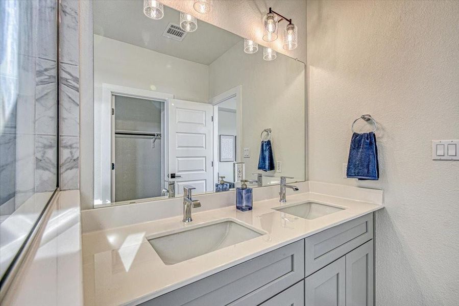 Furnished interior view inside a new home in Townhomes at Gattis, Round Rock (Image 11). Furnished interior view inside a new home in Townhomes at Gattis, Round Rock (Image 11).