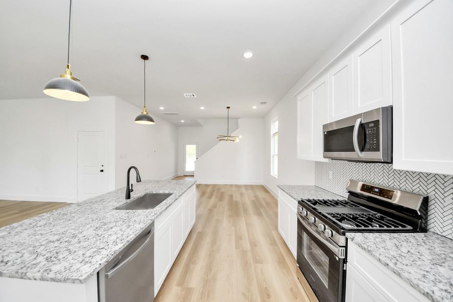 Furnished interior view inside a new home in , Huffman (Image 11).