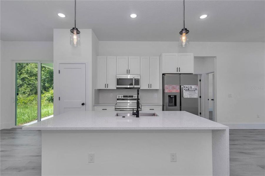 Furnished interior view inside a new home in , Dunnellon (Image 12).