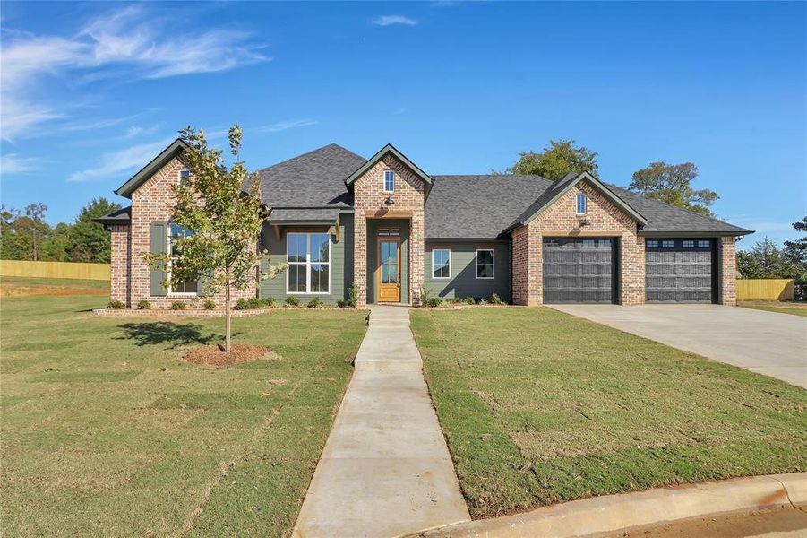 Front exterior of a new home in , Flint, TX, highlighting curb appeal (Image 1).