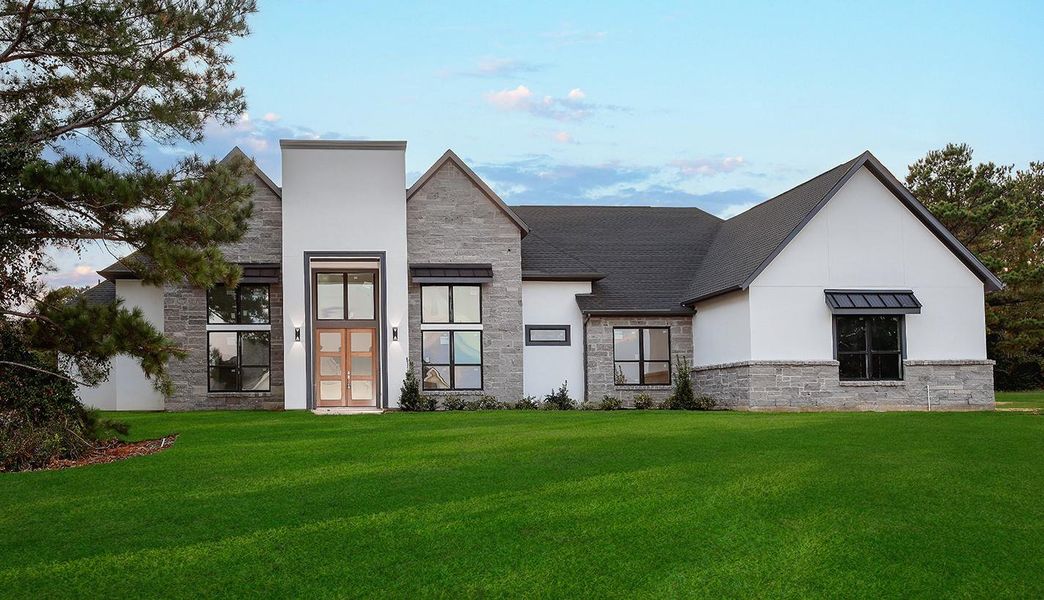Front exterior of a new home in , Montgomery, TX, highlighting curb appeal (Image 1). Front exterior of a new home in , Montgomery, TX, highlighting curb appeal (Image 1).