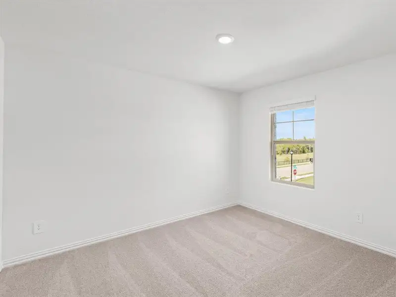 Spacious, unfurnished interior of a new home in Simpson Crossing - Spring Series, McKinney (Image 15).