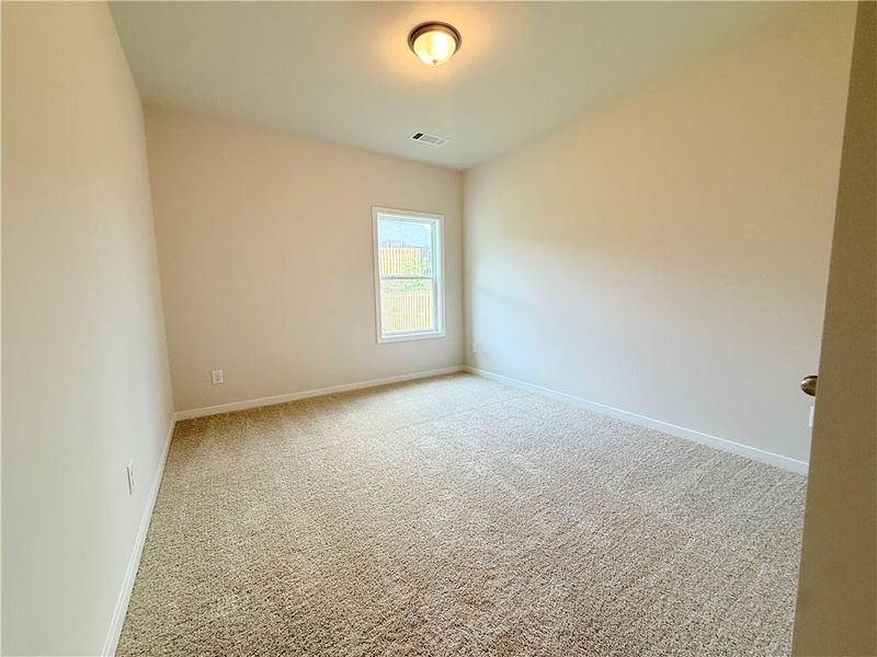 Spacious, unfurnished interior of a new home in Ponderosa Farms Reserve, Gainesville (Image 30).