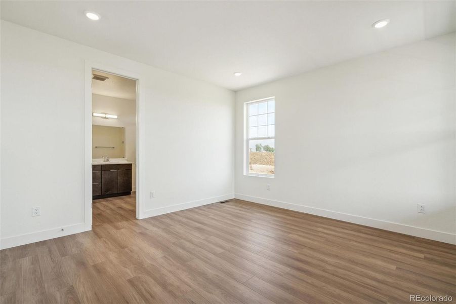 Spacious, unfurnished interior of a new home in Windsong, Thornton (Image 31).