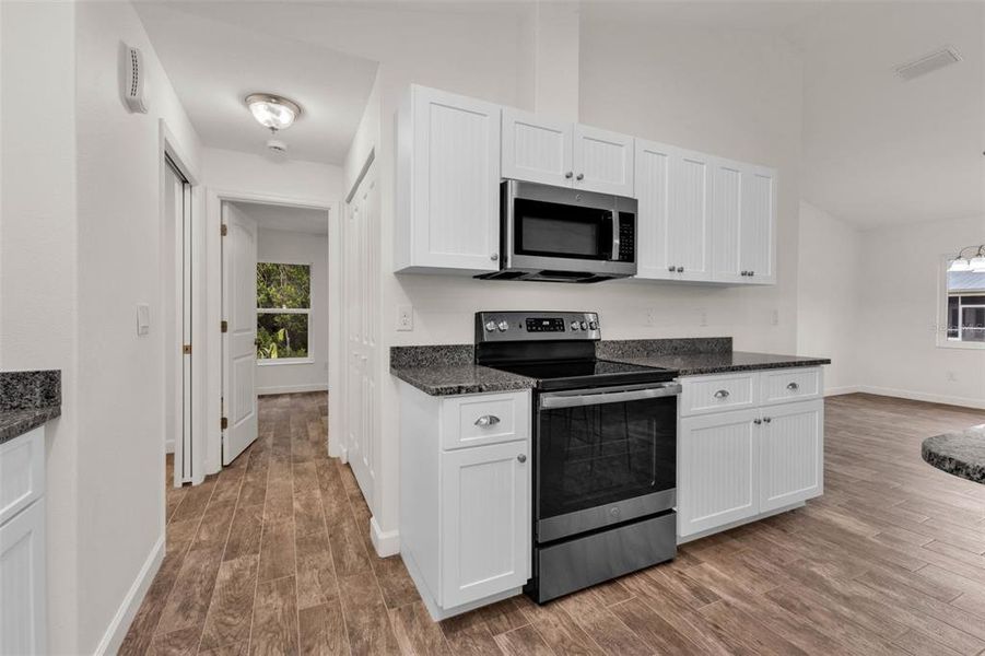 Furnished interior view inside a new home in , Port Charlotte (Image 7).