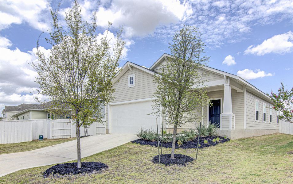 A welcoming facade with a covered porch and an integrated garage awaits you. A welcoming facade with a covered porch and an integrated garage awaits you.