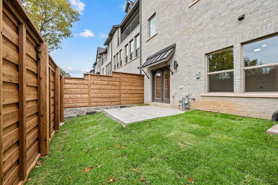 Just off the main floor flex room, you'll enjoy a private fenced back yard.