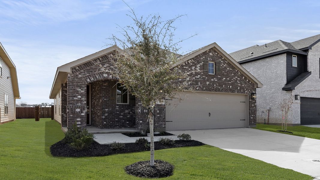 Front exterior of a new home in Keeneland, Aubrey, TX, highlighting curb appeal (Image 2). Front exterior of a new home in Keeneland, Aubrey, TX, highlighting curb appeal (Image 2).