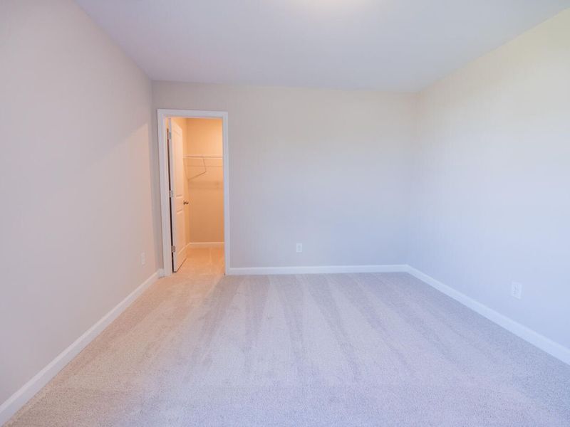 Spacious, unfurnished interior of a new home in Woodland Crossing, Zebulon (Image 14).