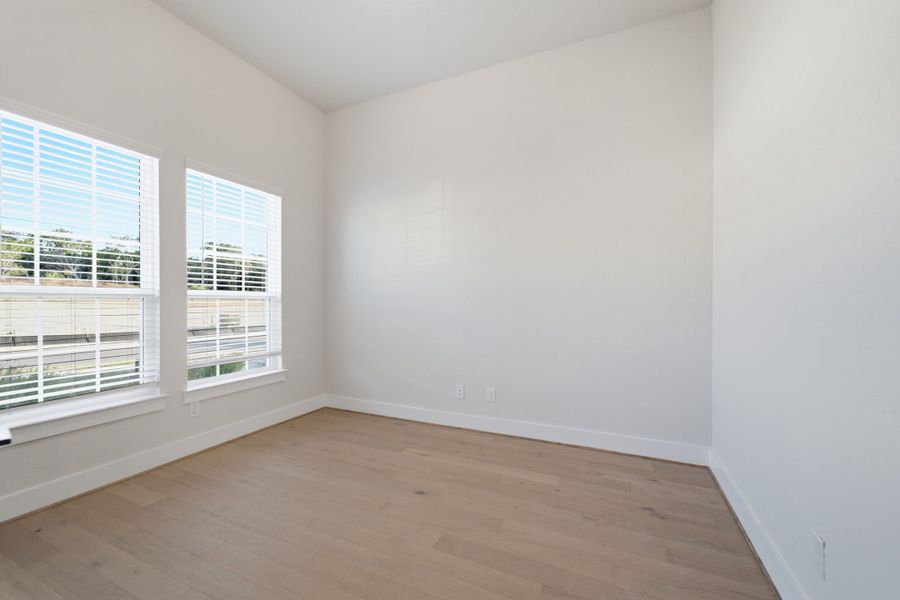 Spacious, unfurnished interior of a new home in The Woodlands at Medina Hills, Mico (Image 21).
