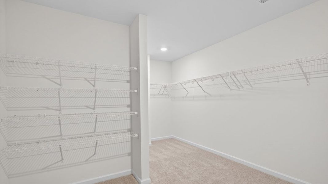 Representative unfurnished interior of a home built from the Wylie by D.R. Horton in Kalas Falls, Wake Forest (Image 27).