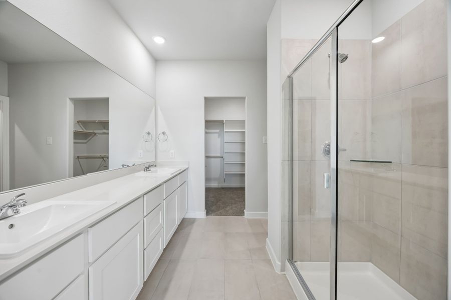 Primary Bathroom in the Mesquite home plan by Trophy Signature Homes – REPRESENTATIVE PHOTO